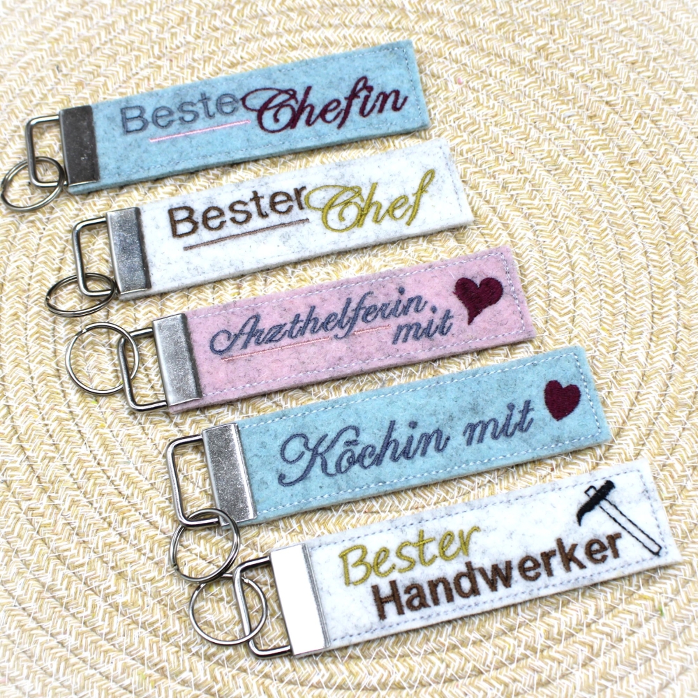 Bild 1 von Stickdatei ITH Schlüsselanhänger Berufe Personen Koch Arzt Chef Trainer Freundin